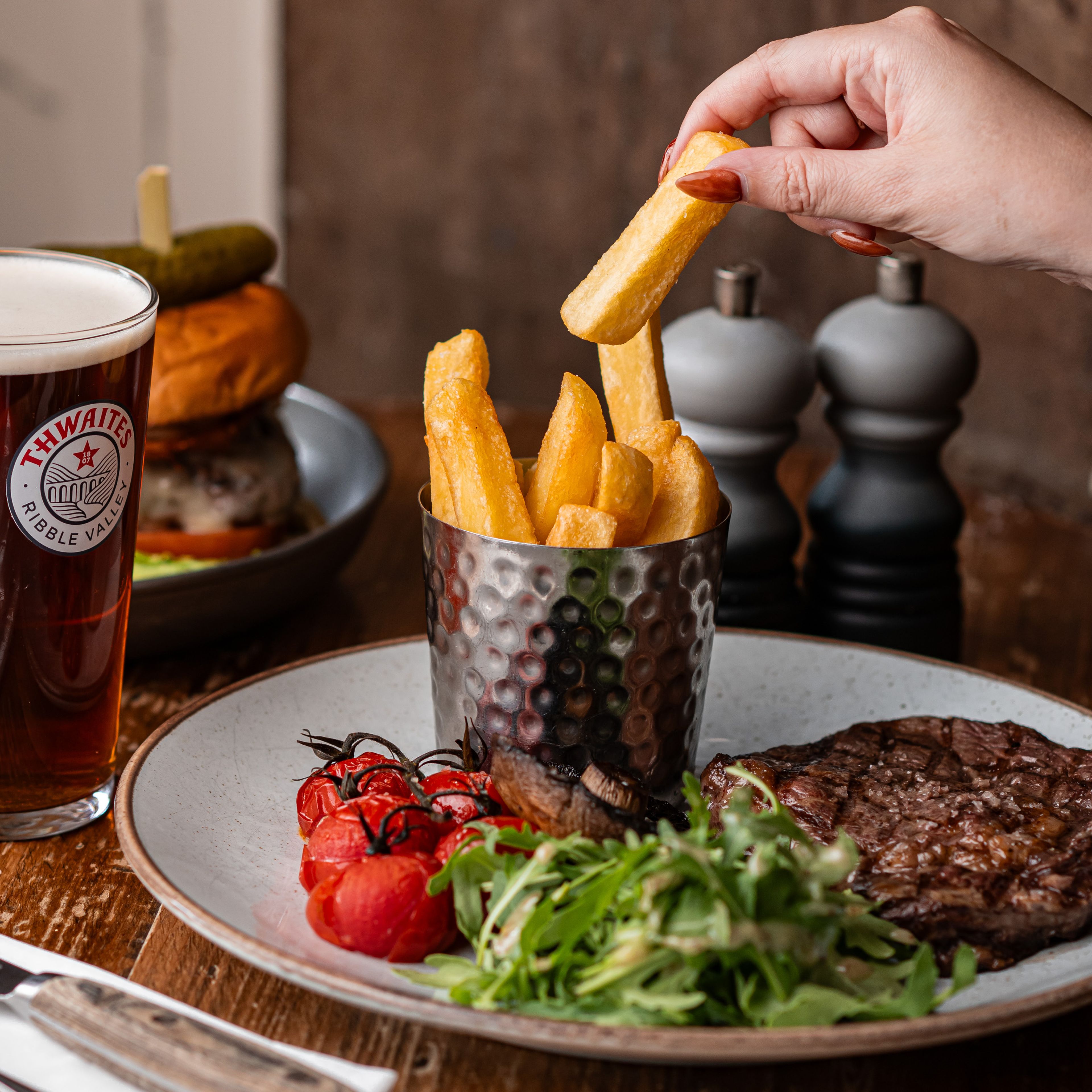 steak and chips with a pint of thwaites ale